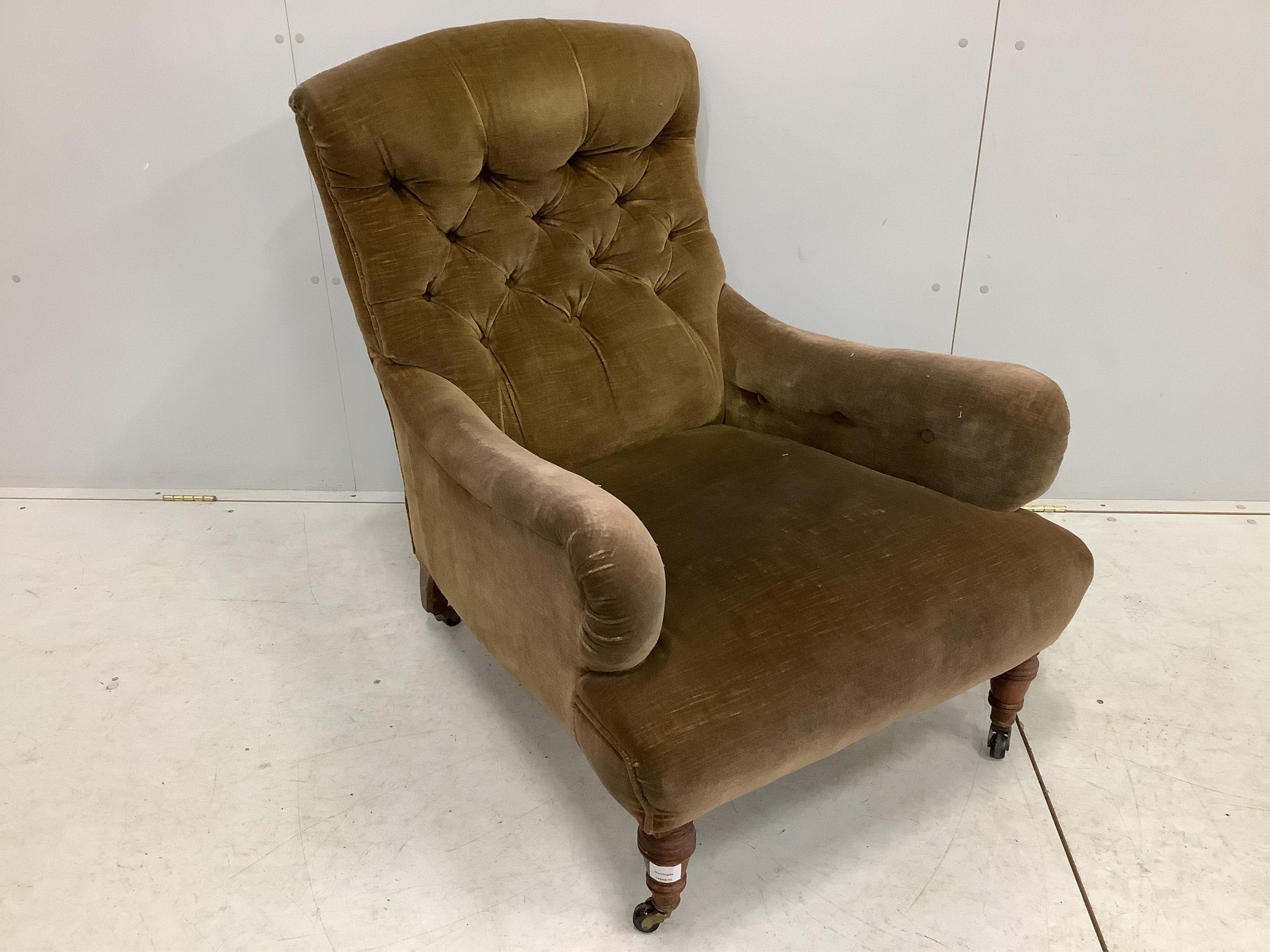 A Victorian Howard style armchair, width 76cm, depth 86cm, height 92cm. Condition - fair